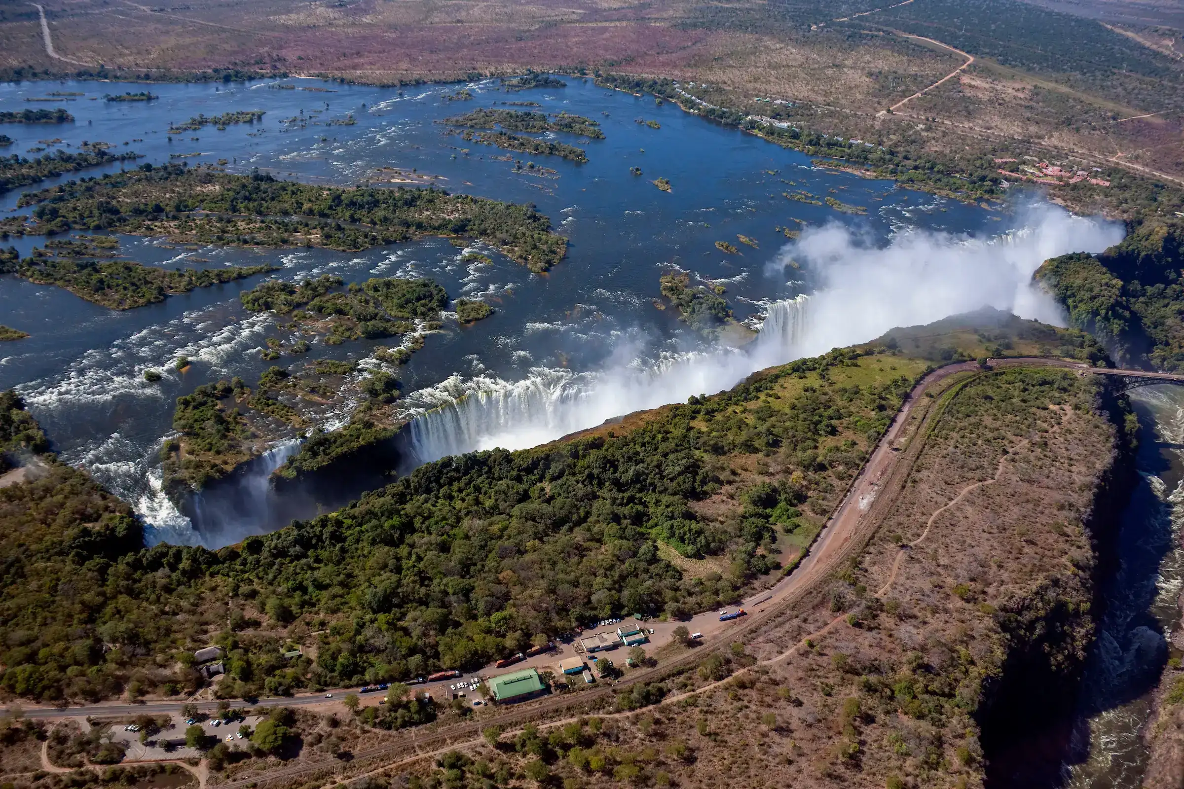 Aerial view of Victoria Falls Zimbabwe and the Zambezi River — luxury Zimbabwe travel with Eventra Bespoke Africa
