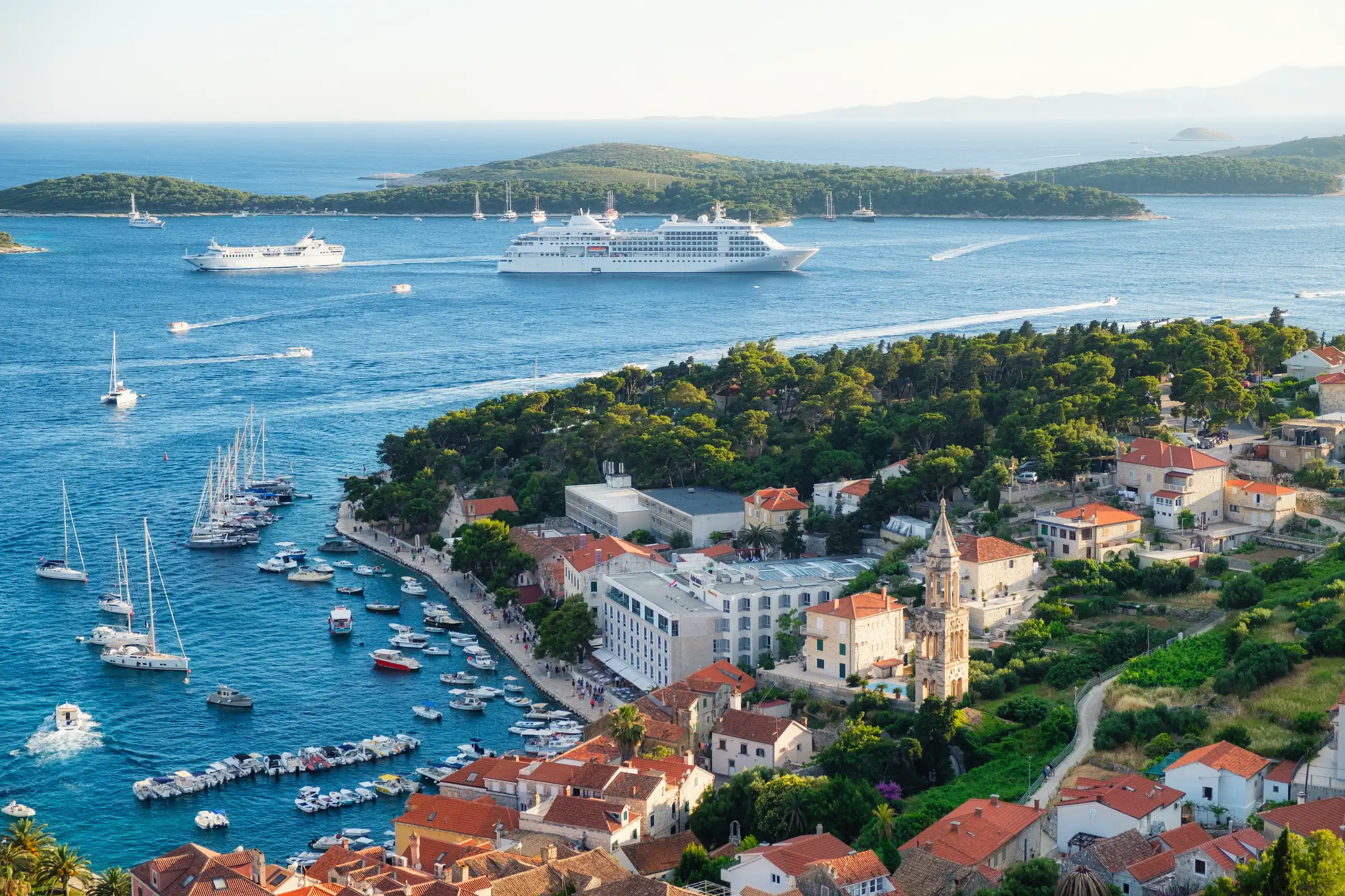 Aerial view of Hvar Island in Croatia with lots of boats, yachts, and cruise ships