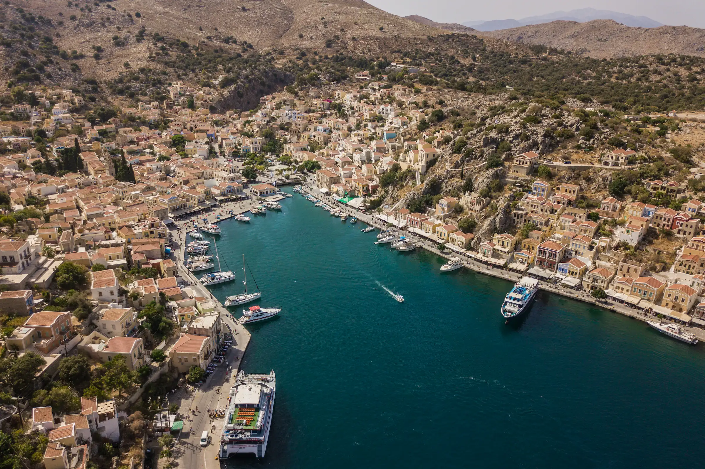Aerial view of a small harbour town on a Greek island