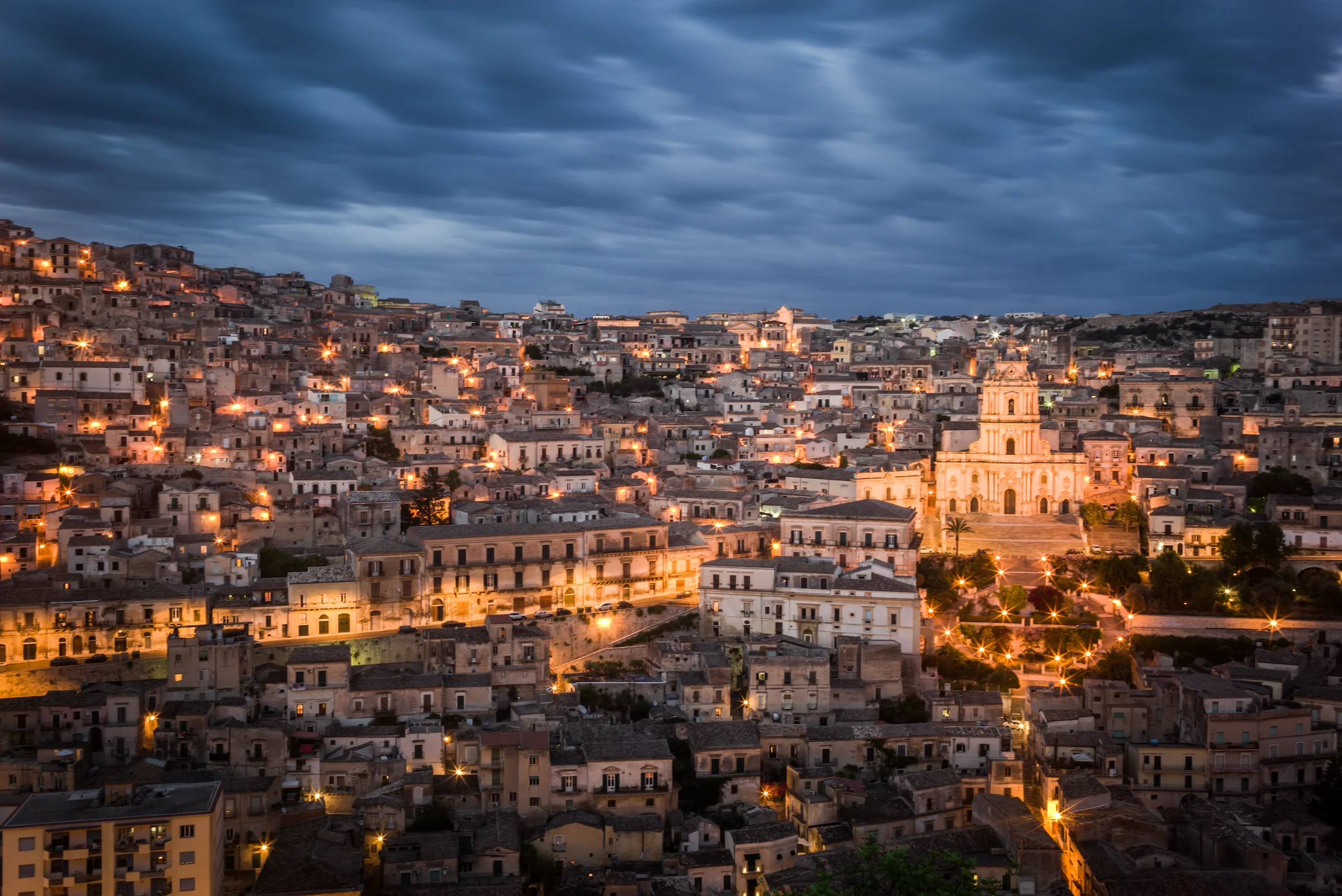 Night view of the lights in the town of Modica in Sicily, Italy