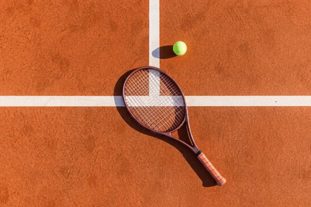 Roland Garros Tennis court with racket and ball