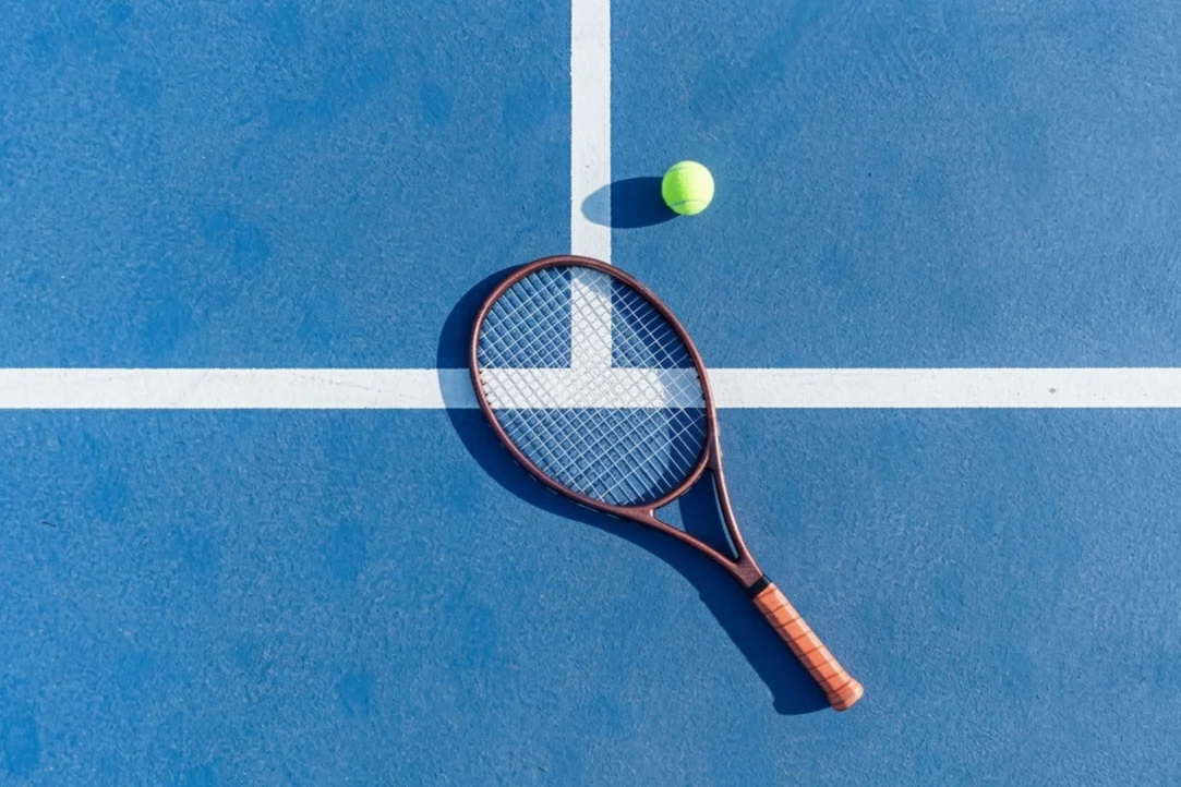 US Open Tennis court with racket and ball