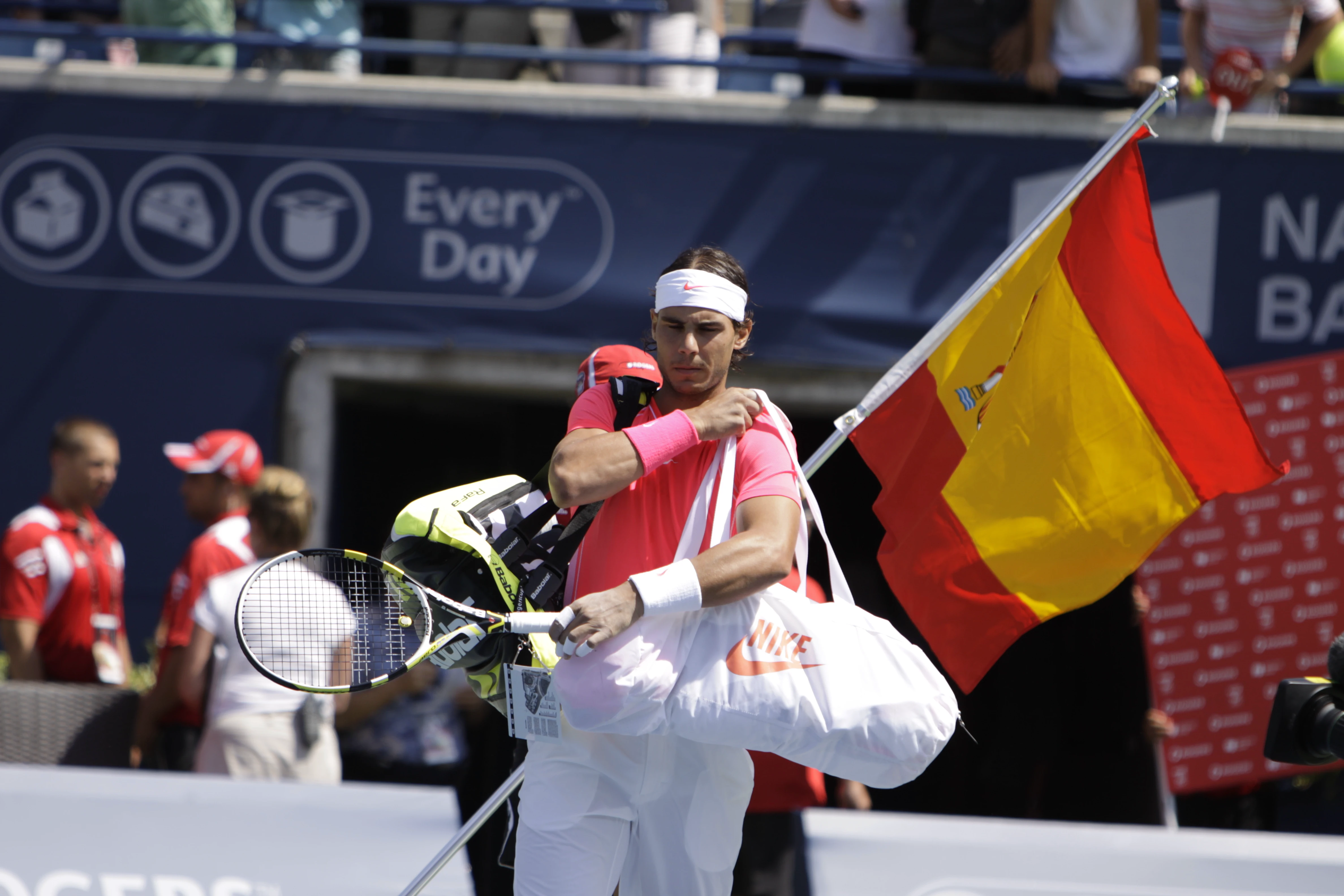 Rafael Nadal holding the Spanish flag before a big tennis match